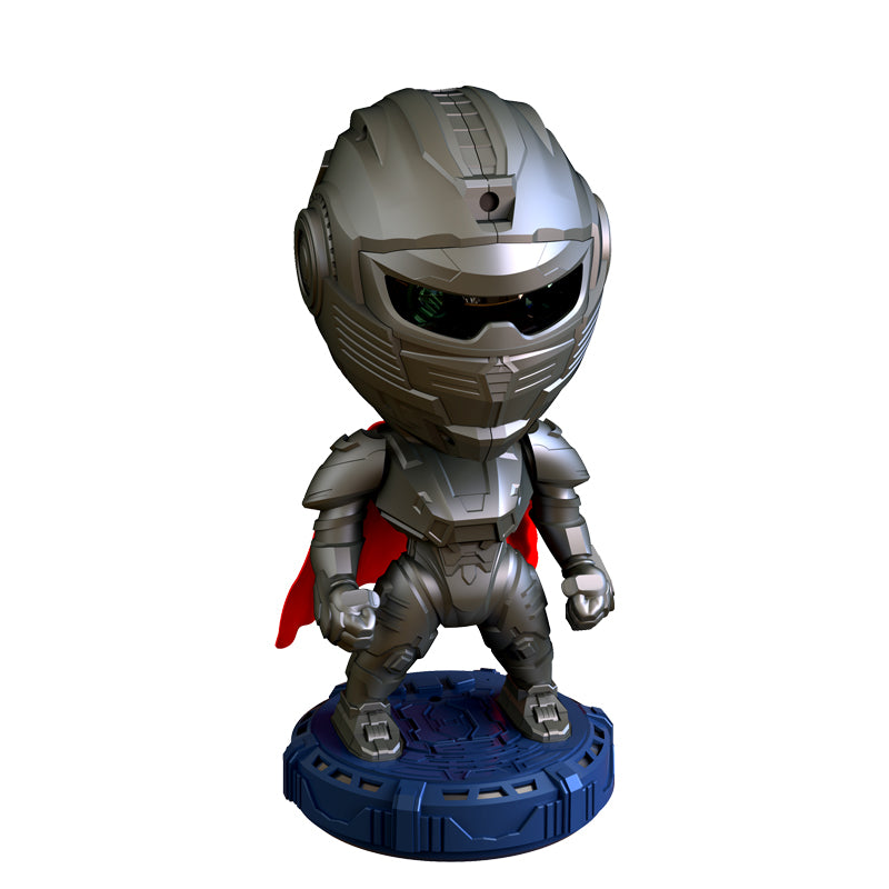 Toy figure of a robot with a helmet and cape on a white background